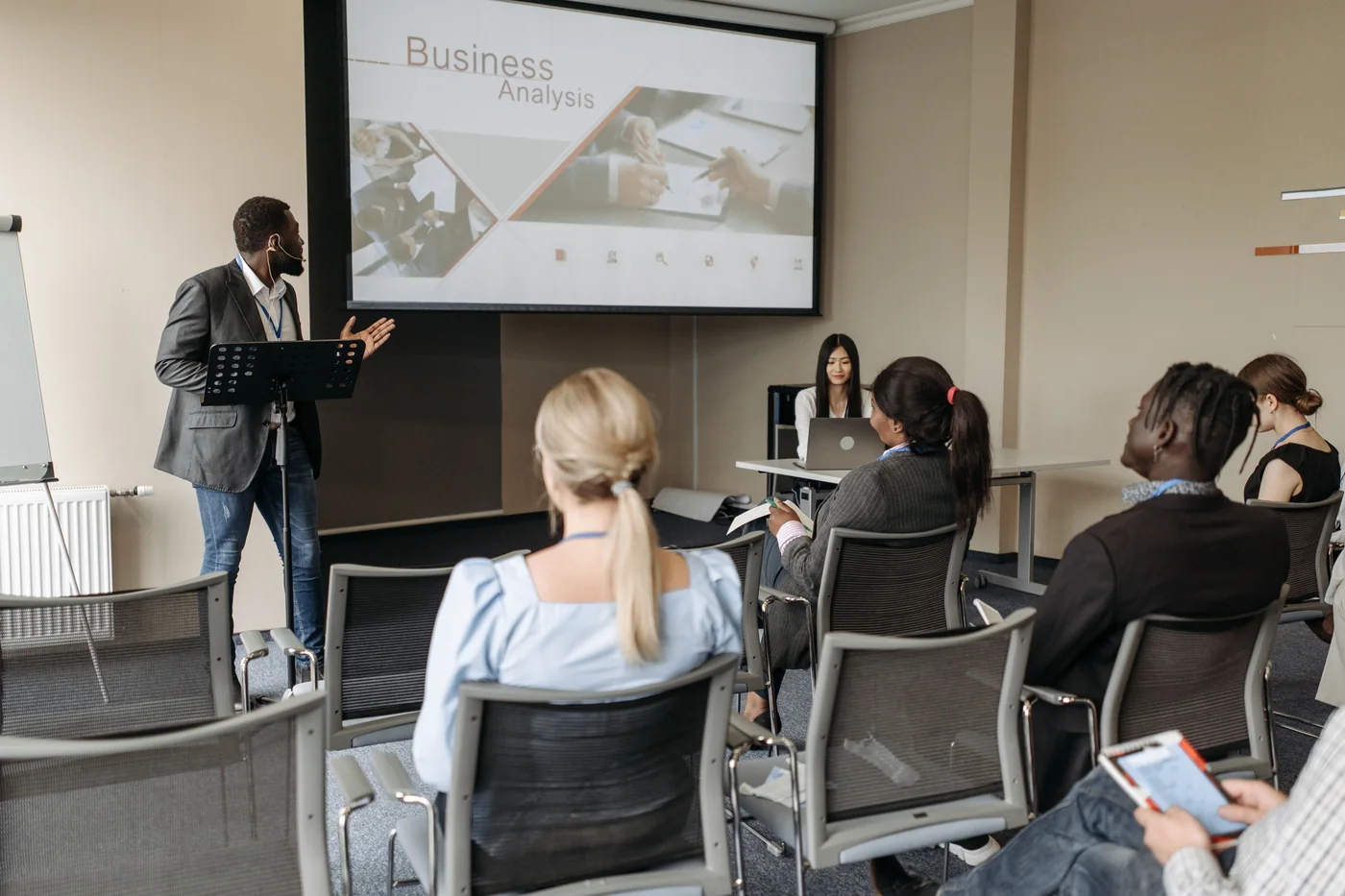 An HR leader presenting policy to a team